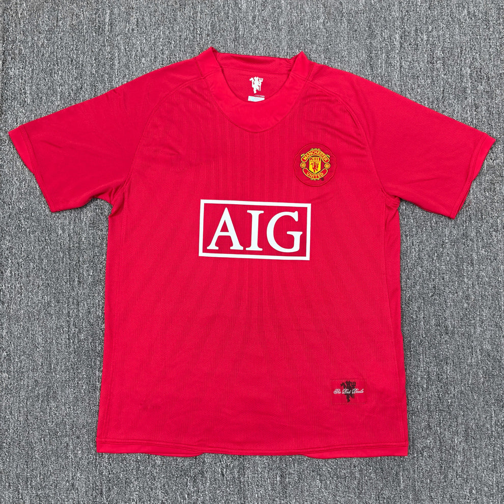 Maillot rétro Manchester United 2008 rouge sponsor AIG, vue de face